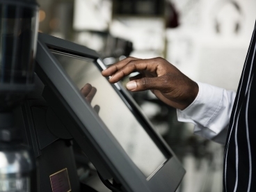A person using a touch screen device