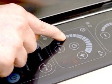 Rugged capacitive touch switch for outdoor cooking