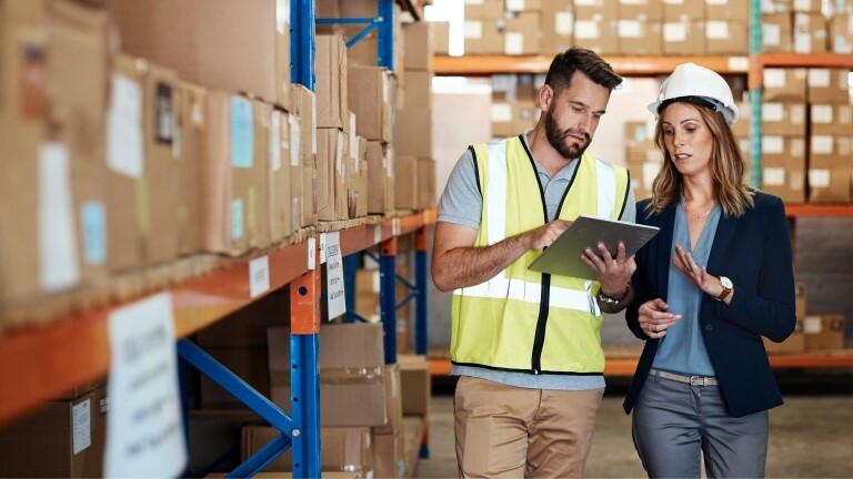 two people taking inventory