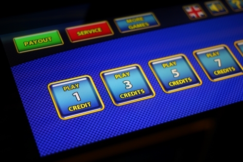 Casino slot machine SAW touch screen