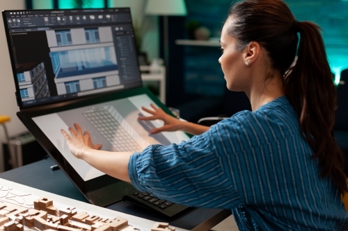 type of interface - UCI - Woman controls computer with touch screen