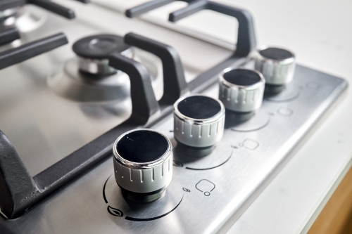 Insert injection molding allows appliance knobs to be produced without extra assembly.