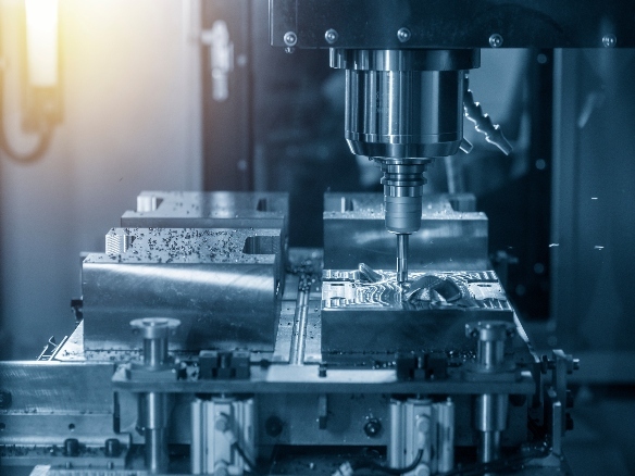 The CNC milling machine rough cutting the injection mold parts by indexable endmill tools